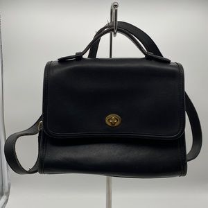 Coach purse blank leather with brass clasp